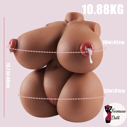 Tan Big Lucy 10,88kg (23,99lbs) - Bambola del Sesso con Torace Esotico, Pelle Abbronzata e Penetrazione del Capezzolo